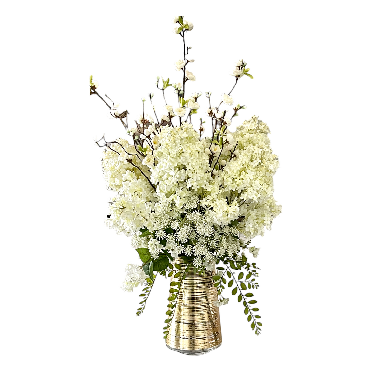 Arrangement of white blooms in gold rimmed vase