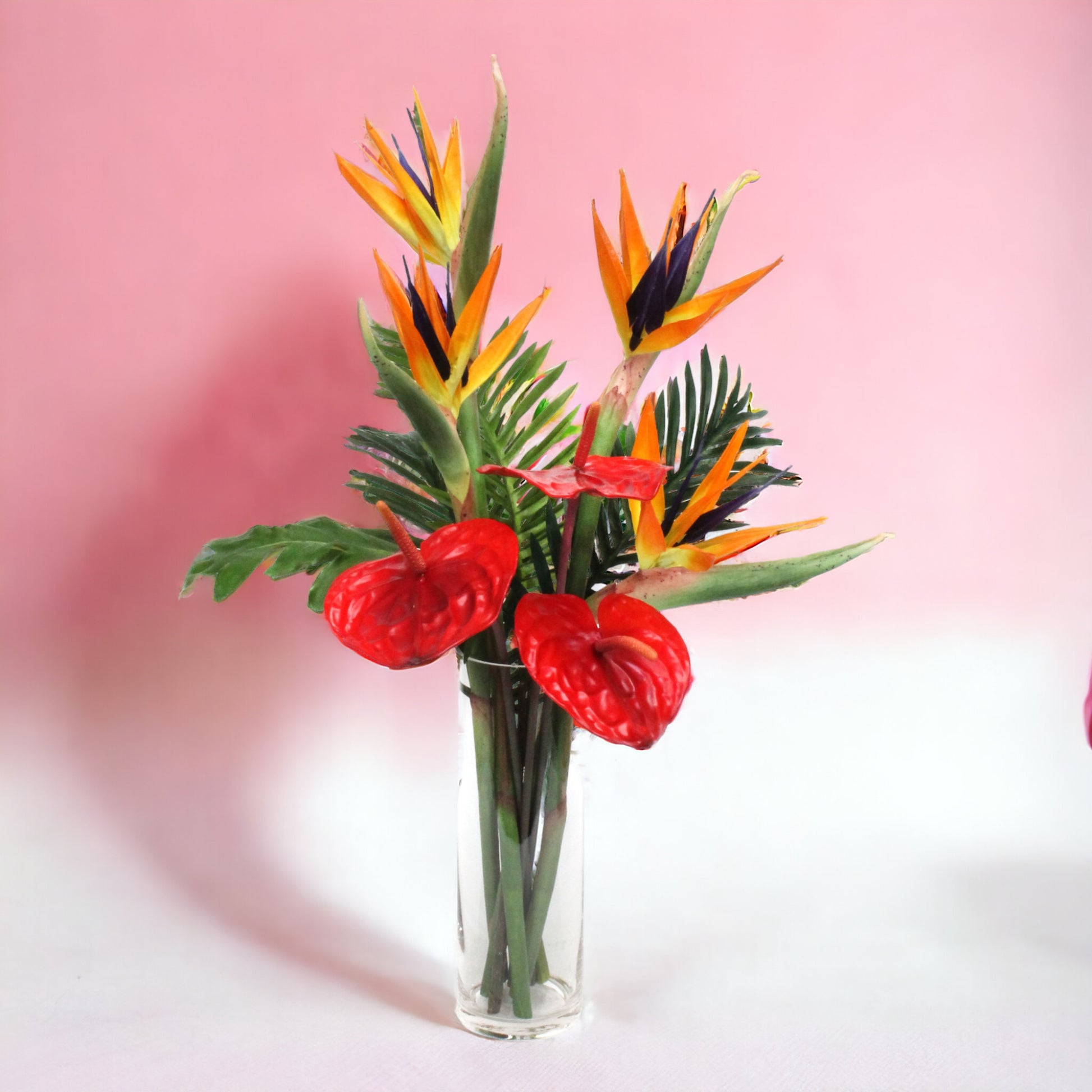 MIKXED TROPICAL ARRANGEMENT WITH BIRDS OF PARADISE 