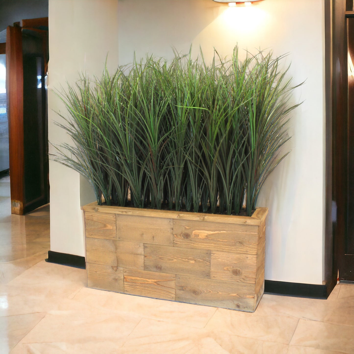 Tall reed grasses in a hand-built wood planter, providing a coastal look and feel. Recommended for indoor use.